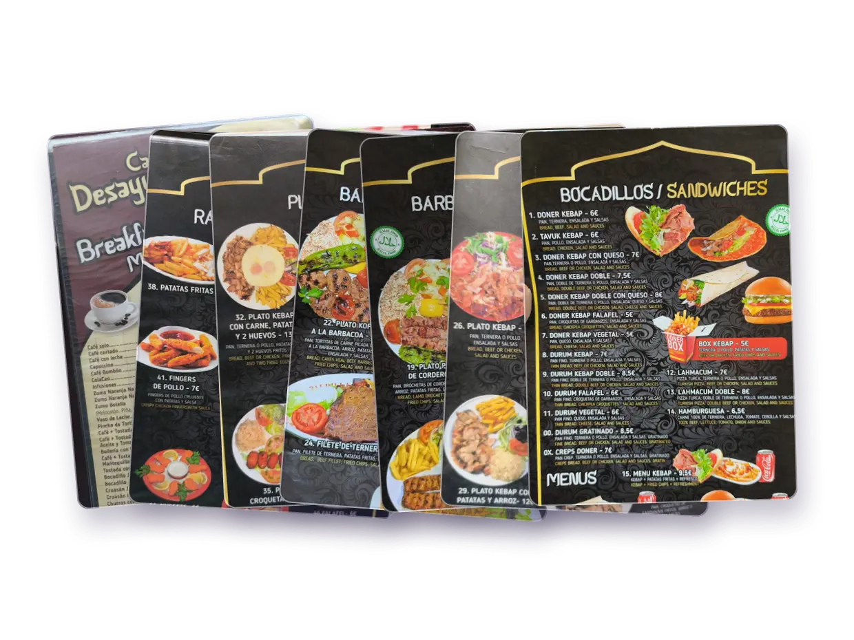 Las siete páginas plastificadas de la carta de Restaurante Mavi Kebap, abiertas en abanico: bocadillos, barbacoa en dos hojas, platos en dos hojas, raciones y desayunos